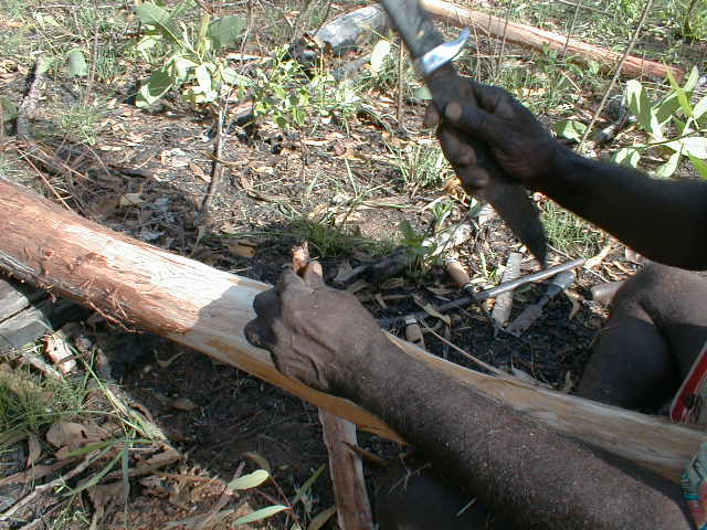 Djalu fixing a yidaki