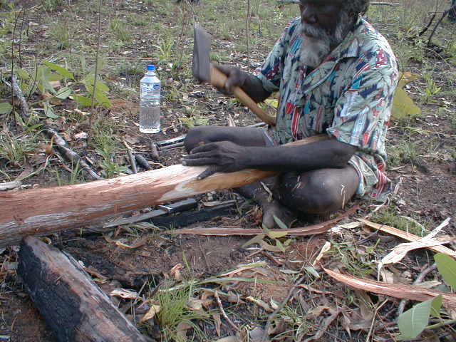 Djalu fixes a didjeridu